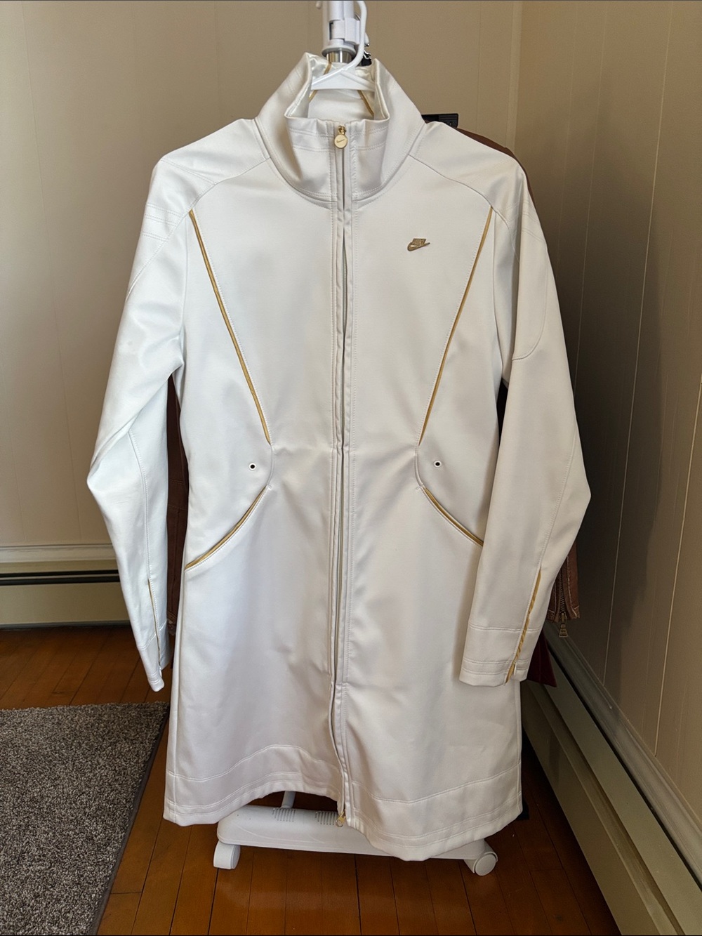 Nike Women's White Long Zip-Front Trench Coat with Gold Accents